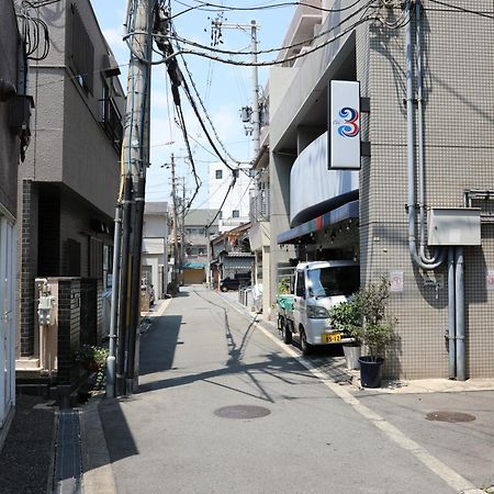 Guesthouse Yours Osaka Exterior photo